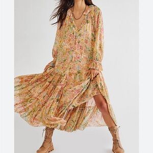 New with tags Free people, "Feeling Groovy" new with tags maxi dress
